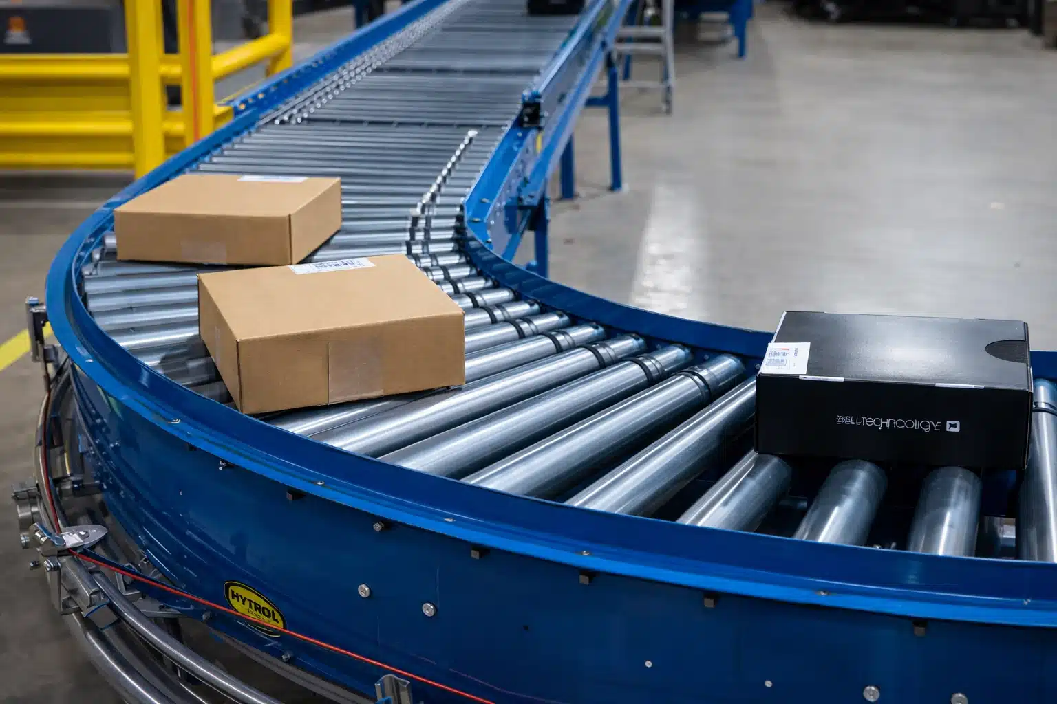 Industrial conveyor systems — live roller conveyor handling packages in a warehouse